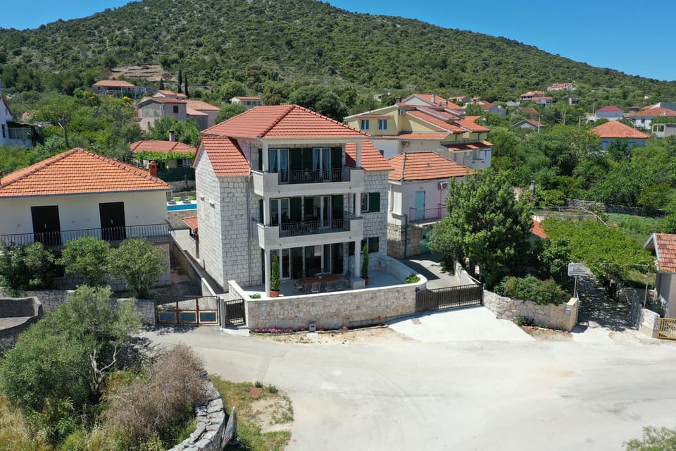 The villa seen from the village lane