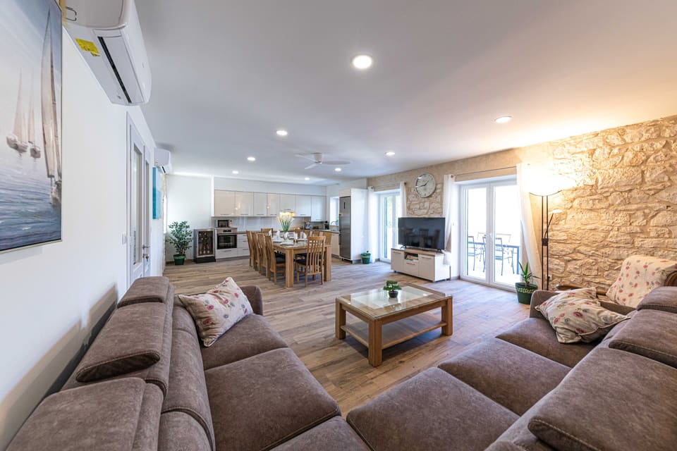 Lounge with sofas and smart TV