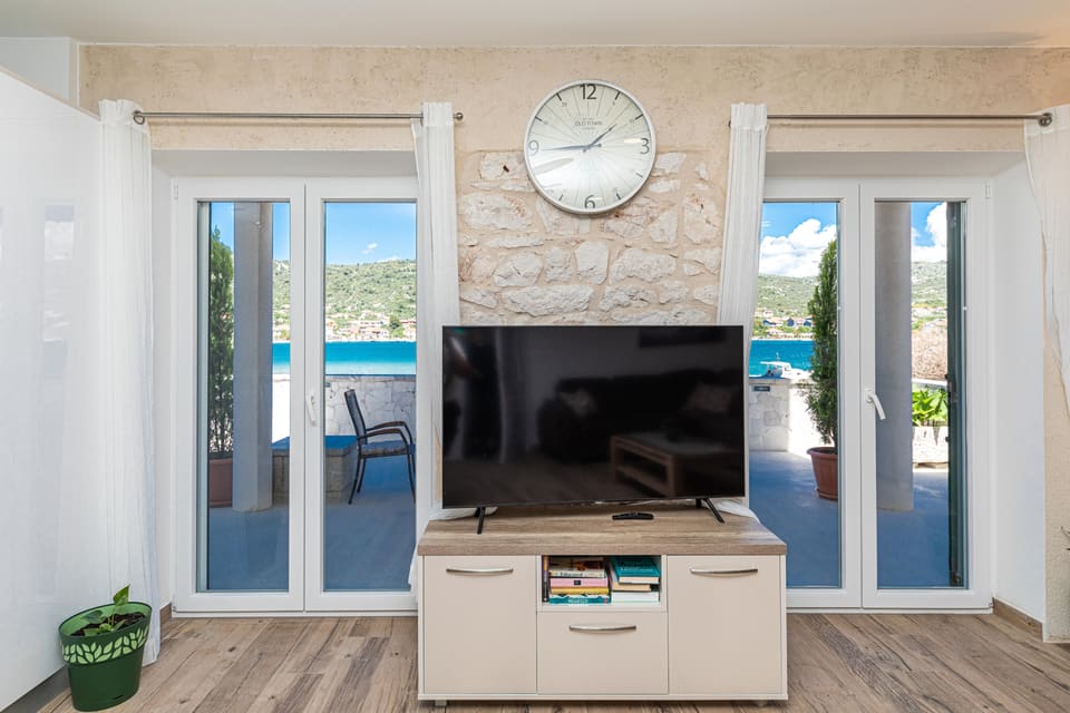 Living room opening to the sea terrace