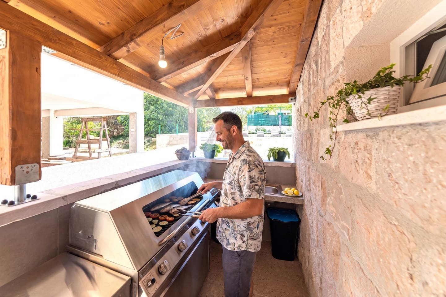 Barbecue area under the stone arch